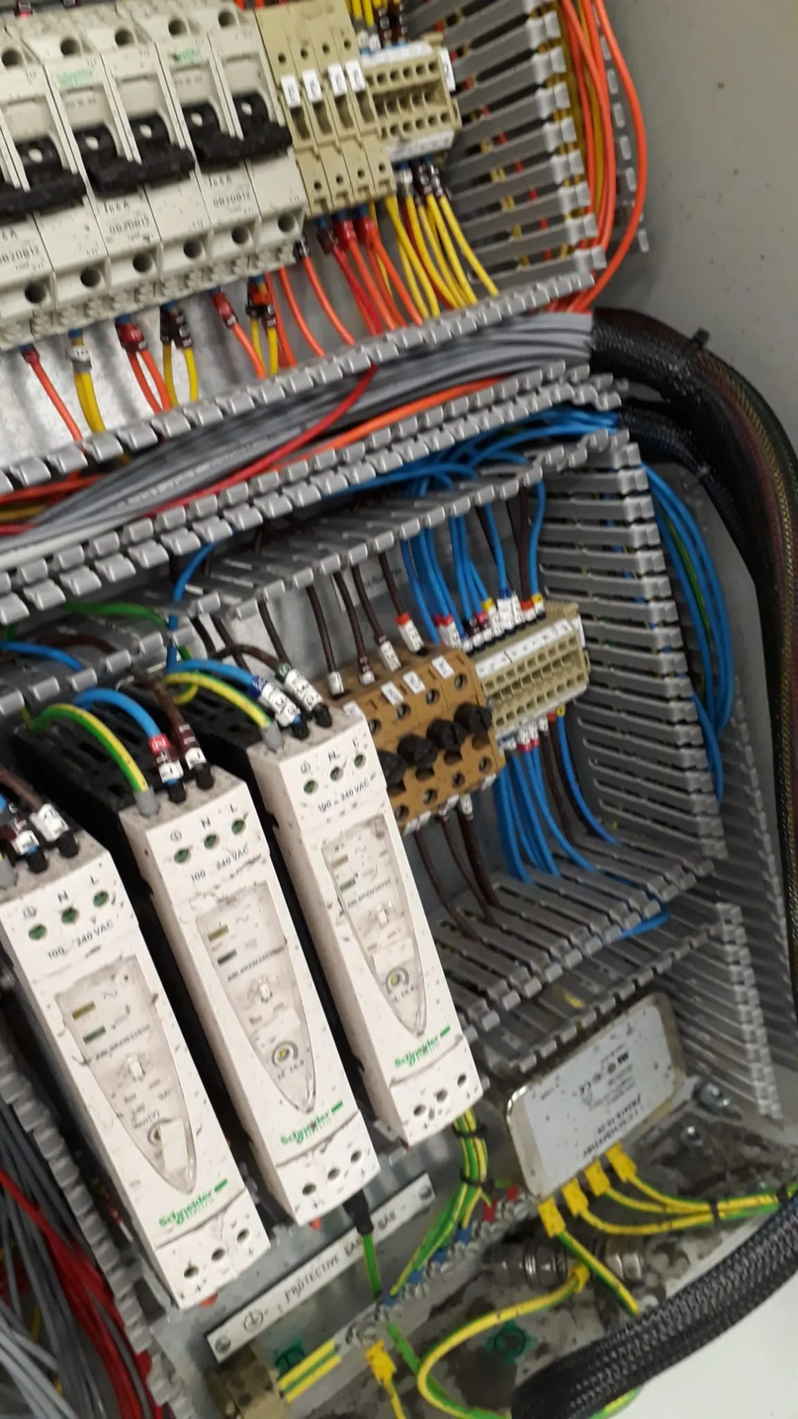 Power supplies and trunking in a control panel